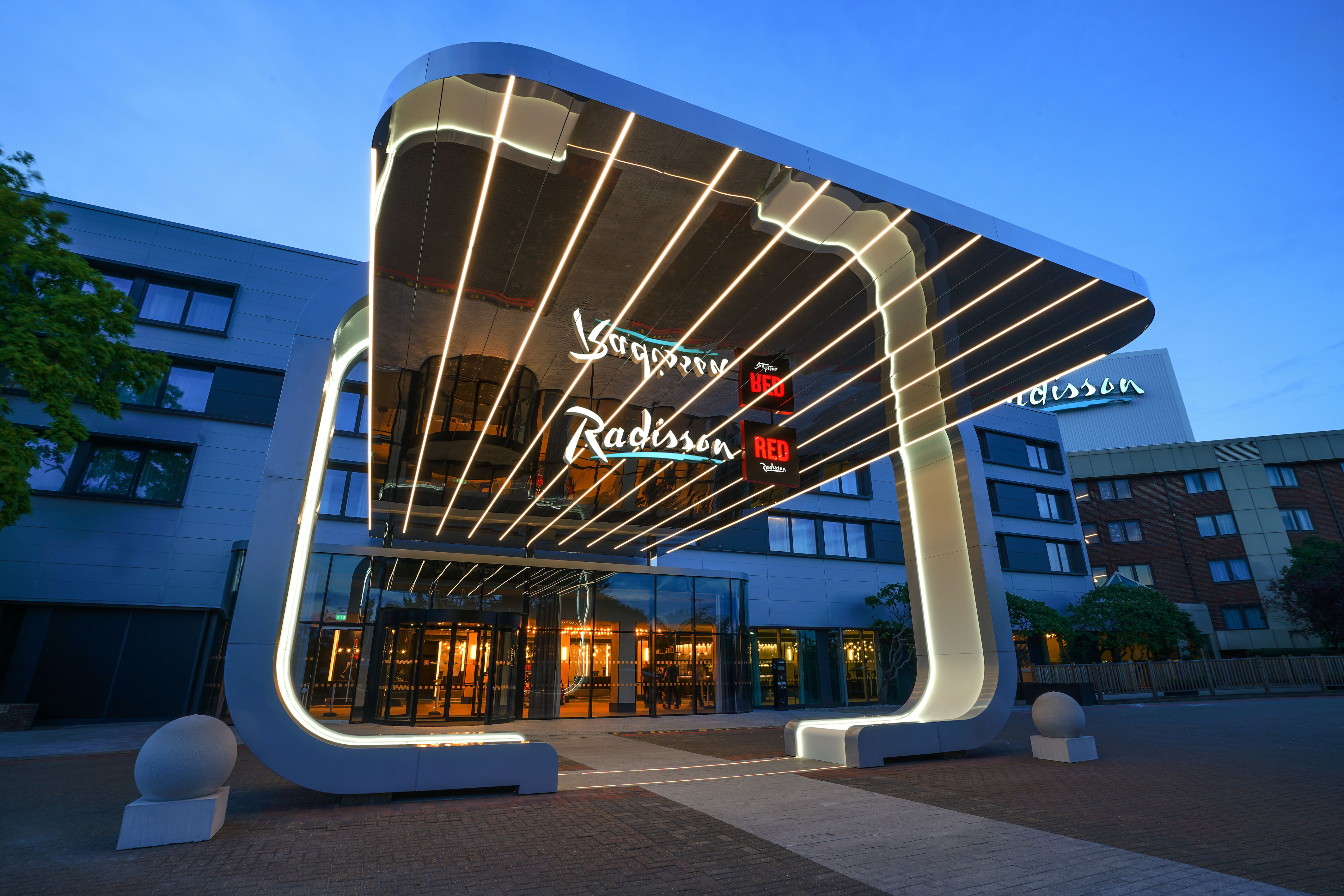 Radisson Red London hotel entrance with bespoke architectural LED lighting canopy