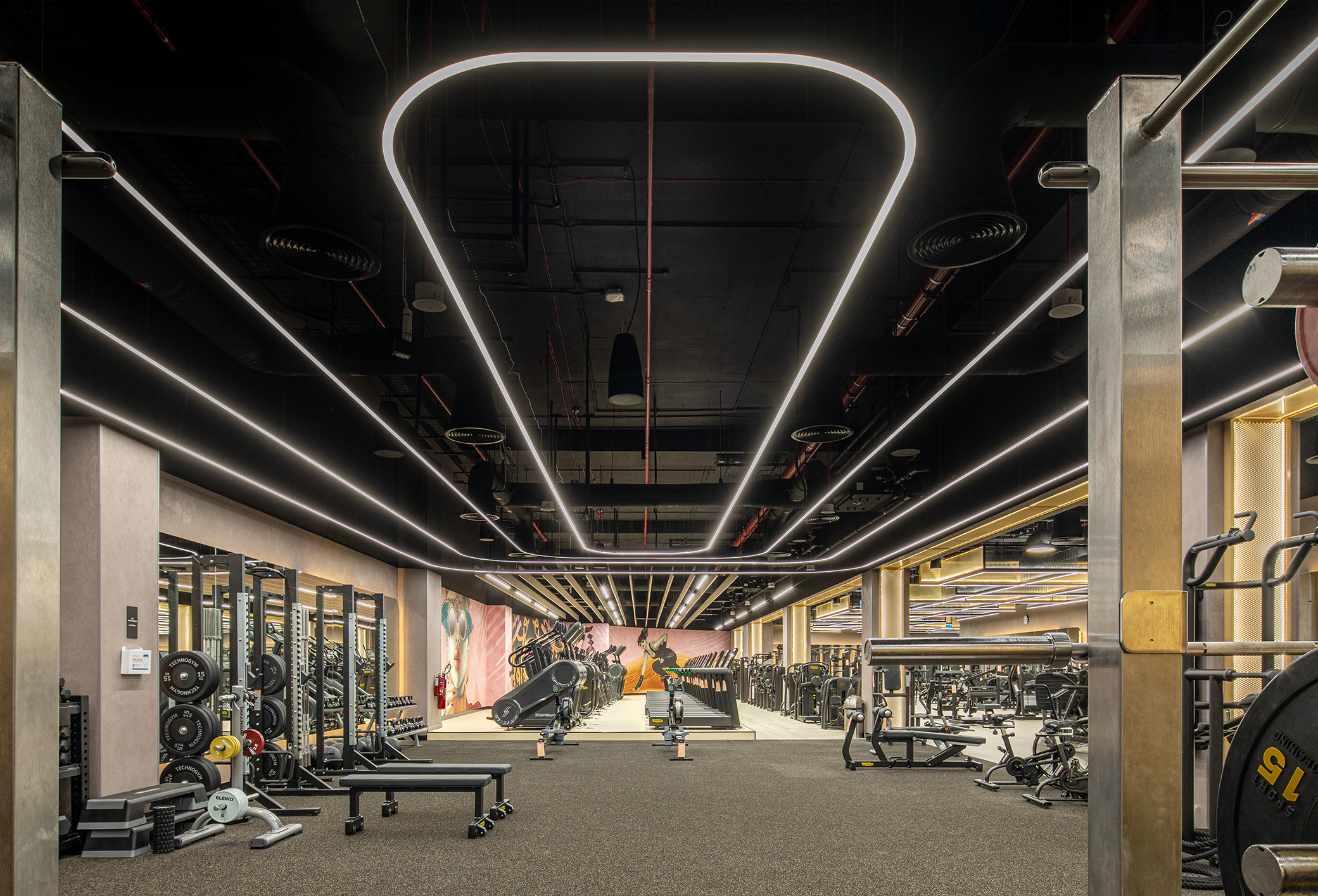 FitNGlam Dubai fitness studio featuring modern linear LED lighting design