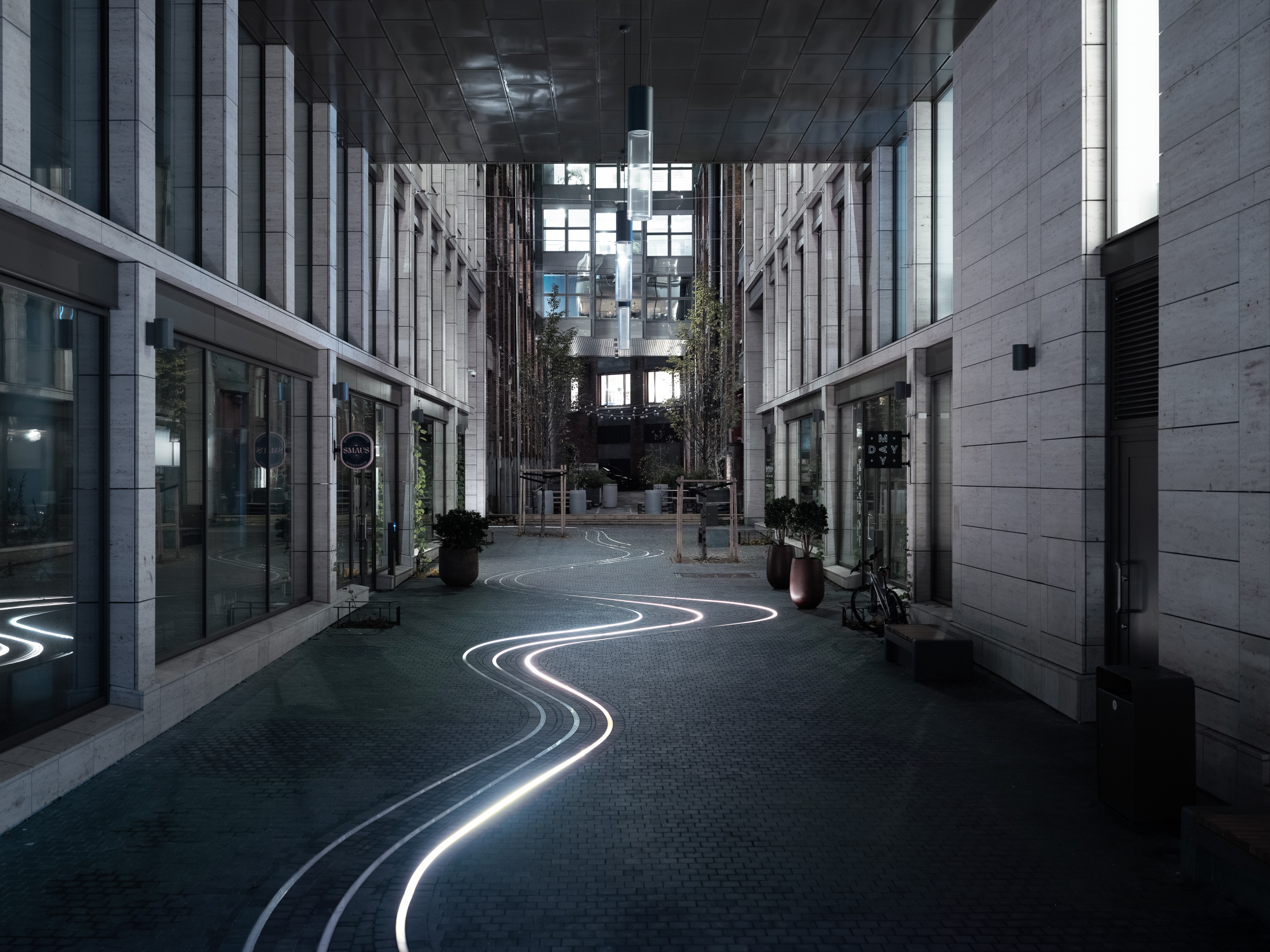 Delta Oslo public realm featuring dynamic linear LED lighting installation
