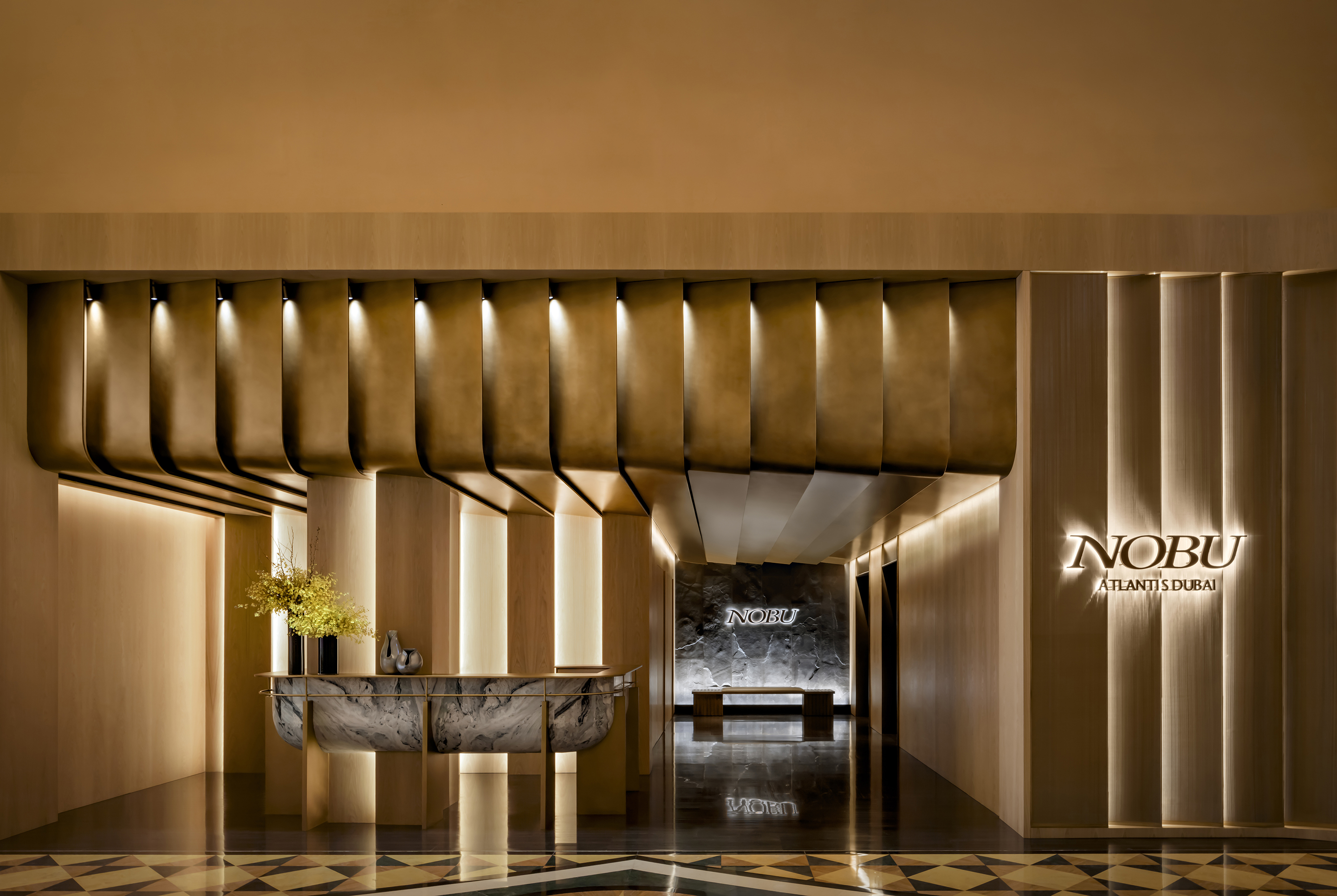 Nobu Atlantis Dubai main entrance featuring bespoke LEDFlex architectural lighting design
