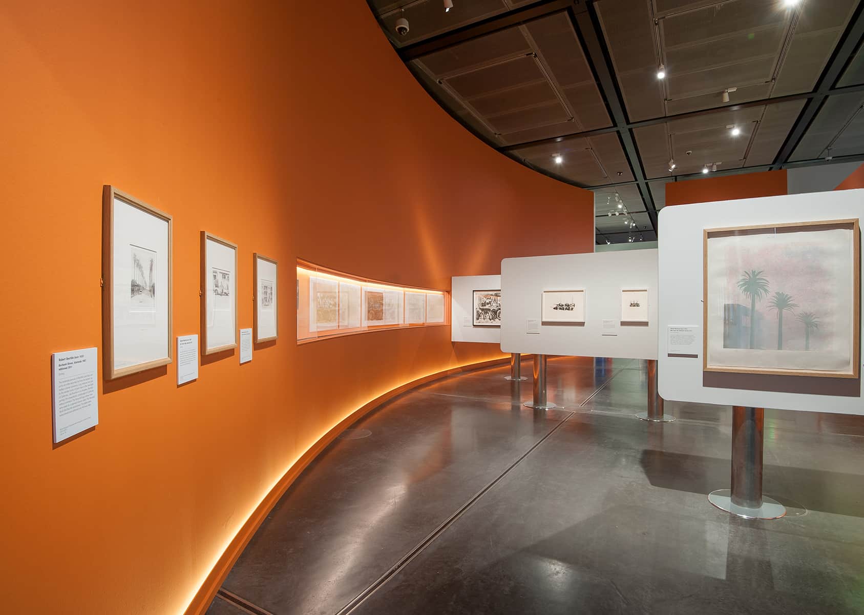 British Museum exhibition gallery with integrated LED lighting highlighting artwork and museum displays